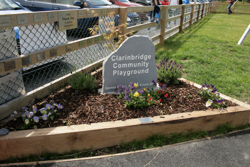 Stone sign for a playground.