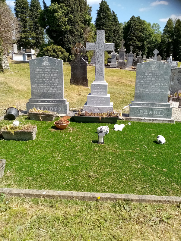 After picture of cross restoration with new inscription.